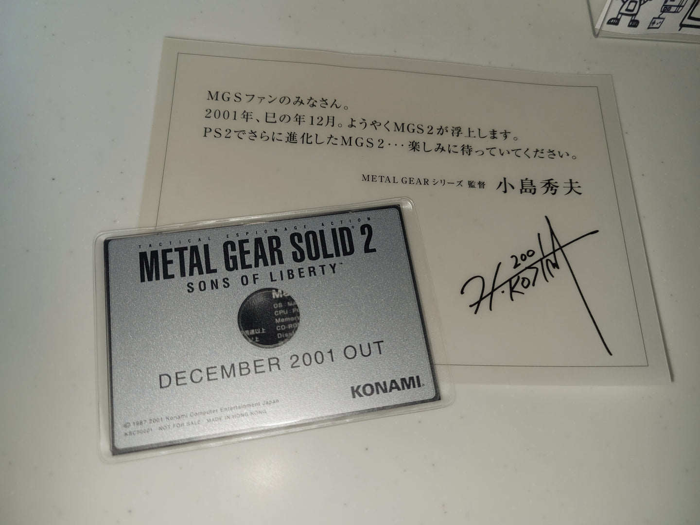 Metal Gear Solid 2 pre release promo card/cd - toy action figure gadgets